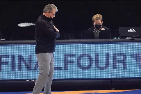  ?? Morry Gash / Associated Press ?? UConn coach Geno Auriemma reacts on the bench during the second half of Friday’s loss to Arizona in the Final Four of the NCAA Tournament at the Alamodome in San Antonio.