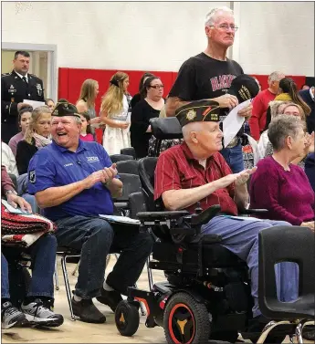  ?? Photograph by Megan Davis ?? Emotions were high, and mixed, as veterans from each branch and several conflicts were recognized for their sacrifices.