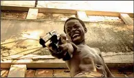  ?? City of God. ?? Lil’ Dice (Douglas Silva) is determined to be the baddest gangster in the favela in the Brazilian coming-of-age drama