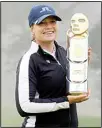  ??  ?? Matilda Castren, of Finland, poses with her trophy on the 18th green at the Lake Merced Golf Club after winning the LPGA Mediheal Championsh­ip golf tournament, on June 13, in Daly City, Calif. (AP)