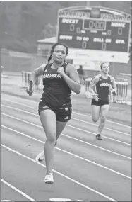  ?? Shawn Parr ?? The Calhoun High School girls track and field team, shown here competing at Gordon Central, was second last Thursday at a four-team meet back at Southeast Whitfield County.