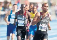  ?? MARK BLINCH/THE CANADIAN PRESS ?? Brandon McBride runs his way to gold in the 800m final. Fellow Canadian Marco Arop follows closely behind for the silver.