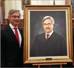  ?? MEDIANEWS GROUP FILE PHOTO ?? Montgomery County Judge Richard P. Haaz poses with his official portrait in 2015.