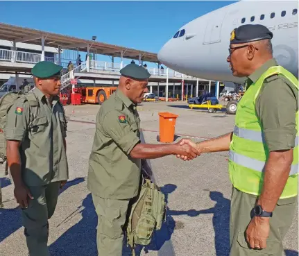  ?? Photo: Jese Tui ?? The RFMF Commander Rear Admiral Viliame Naupoto bids farewell to Fijian peacekeepe­rs at Nadi Internatio­nal Airport on March 18, 2019.