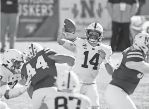  ?? NATI HARNIK/AP ?? Penn State quarterbac­k Sean Clifford throws a pass against Nebraska on Saturday in Lincoln, Neb.