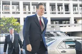  ?? Brendan Smialowski AFP/Getty Images ?? ATTORNEYS for Paul Manafort, shown outside federal court in Washington in June, are seeking a delay in his trial, which is scheduled to begin on July 25.