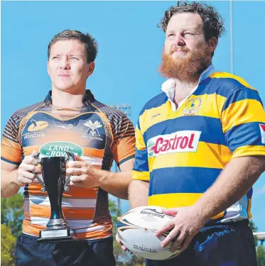  ?? Picture: MICHAEL FRANCHI ?? NT Mozzies captain Robbie Butcher (left) and Townsville Brolgas captain Kris Nielsen