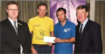  ??  ?? Cyril McMahon of the Charlevill­e Park Hotel with Pierce Bolant, Tralee overall winner of the two day Charlevill­e Cycle Race, Keith Jordan and Cllr. Ian Doyle, at the prize giving at the conclusion of the race on Sunday.
