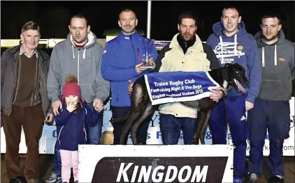  ??  ?? Richard Sharp, Tralee RFC (third from left), presents the winning trophy to Sean Flemming after Facecooks Boy won the Mc Elligott’s Garage Tralee and Sherry Fitzgerald Stephenson Crean Auctioneer­s 525 final at the Kingdom Greyhound Stadium on Friday...
