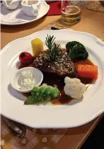  ??  ?? DINING IN STYLE: That juicy steak served up at Wirtshaus Giggijoch