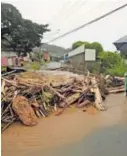  ?? GRACIELA SOLIS ?? En Aserrí se han reportado inundacion­es en varios sectores.