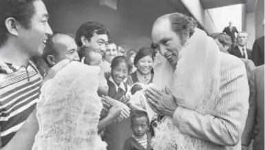  ?? TORONTO STAR ARCHIVES ?? Former prime minister Pierre Trudeau, pictured with Tibetan refugees in 1971, was determined to boost Canada’s immigratio­n.