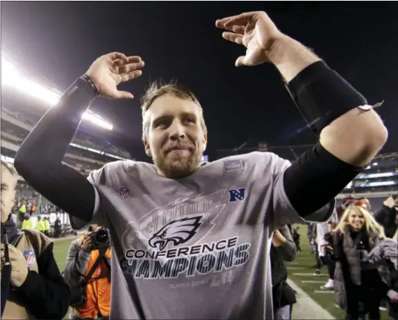  ?? MATT ROURKE — THE ASSOCIATED PRESS ?? The Eagles’ Nick Foles celebrates after NFC championsh­ip game against the Vikings Sunday in Philadelph­ia.