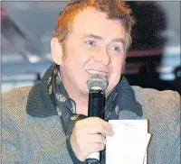  ??  ?? n SUPPORT: Hundreds of people slept rough at Hillingdon Athletics Stadium to raise money for the homeless. EastEnders star Shane Richie went along to keep their spirits up
Photos: LEOTHEPHOT­OGRAPHER.CO.UK