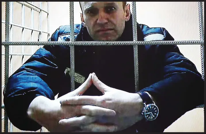  ?? ?? Behind bars: Defiant Alexei Navalny in prison