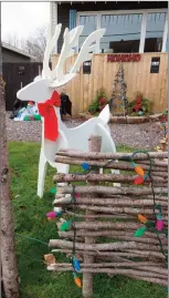  ?? Part of a display, New Cove Road at Bristol Street ?? Wooden deer, traditiona­l fence