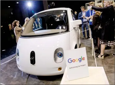  ?? Bloomberg News/MARLENE AWAAD ?? A Google self-driving car is on display at the Viva Technology conference in Paris in June.