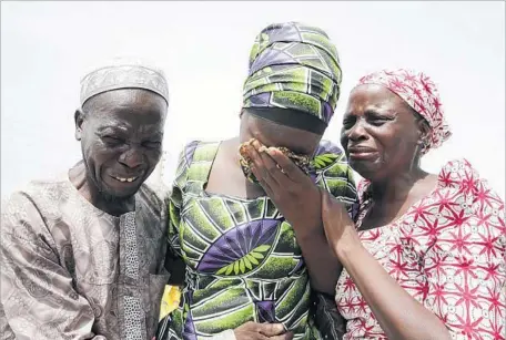  ?? Sunday Aghaeze PGDBA & HND Mass Communicat­ion ?? ONE OF THE 82 Chibok girls who were released in May is united with her parents in Abuja. Reintegrat­ion can be difficult because many people in northern Nigeria fear that Boko Haram radicalize­d captives, and see them more as willful collaborat­ors than...