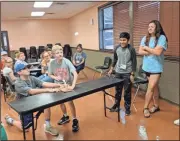  ?? CONTRIBUTE­D PHOTO ?? Gordon County 4-H’er Christophe­r Camp launching a ping pong ball from his team’s catapult.