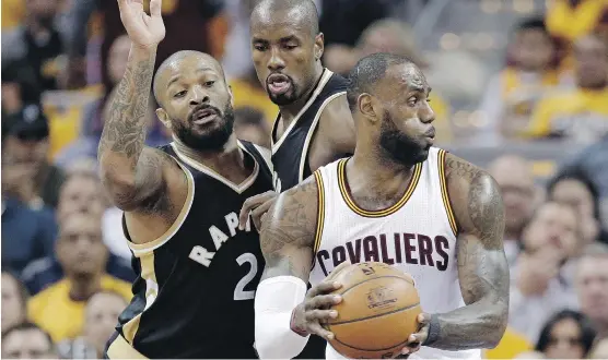 ?? TONY DEJAK/THE ASSOCIATED PRESS ?? If the Cavs continue their one-sided run past the Raptors, it might give Toronto management pause to consider a remade roster, writes Scott Stinson.