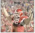  ??  ?? Grant Cook of Arkansas celebrates after an LSU fumble late in the fourth quarter. (Arkansas Democrat-Gazette file photo)