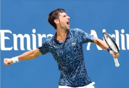  ?? FRANK FRANKLIN II AP FOTO/ ?? CELEBRATIO­N.Novak Djokovic celebrates after a four-set win against Marton Fucsovics of Hungary during the first round of the US Open tennis tournament.