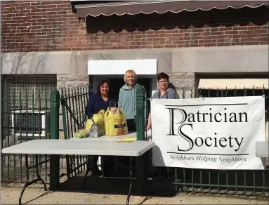  ?? SUBMITTED PHOTO ?? Manning the tables for pickup outside the Patrician Society are, from left, Jackie DiPasquale, Food Cupboard and Volunteer Coordinato­r, Debbie D’Orazio, volunteer, and LeeAnn Rooney, Executive Director.