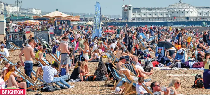  ??  ?? BRIGHTON
Brighton rocks: Thousands of sunseekers flocked to British beaches yesterday as temperatur­es hit the mid-70s. The rest of the weekend is expected to be hotter