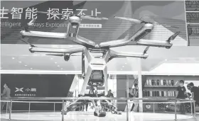  ??  ?? 2020年9月26日，在北京国际展车上，小鹏汽车的概念飞行汽­车——旅航者T1视觉中国图