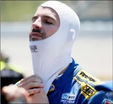  ??  ?? In this July 19 file photo, Alexander Rossi gets set for qualifying for an IndyCar Series auto race at Iowa Speedway in Newton, Iowa. AP Photo/chArlIe neIbergAll