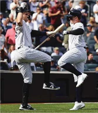  ?? ADAM HUNGER/AP ?? Anthony Rizzo (right) and Aaron Judge have formed quite a power duo for the Yankees.