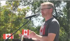  ?? Photo by Matthew Liebenberg ?? Swift Current MLA Everett Hindley speaks during the Canada Day flag raising ceremony in Memorial Park, July 1.