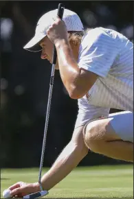  ?? Arkansas Democrat-Gazette/JOHN SYKES JR. ?? Max Master of Harding Academy lines up a putt on the 12th hole Tuesday as part of his 2-over round of 73 at the Burns Park Championsh­ip Course. He claimed medalist honors at the Class 3A boys state tournament in North Little Rock.