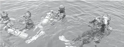  ??  ?? LEGA: Penyelam lega dapat melakukan aktiviti menyelam.