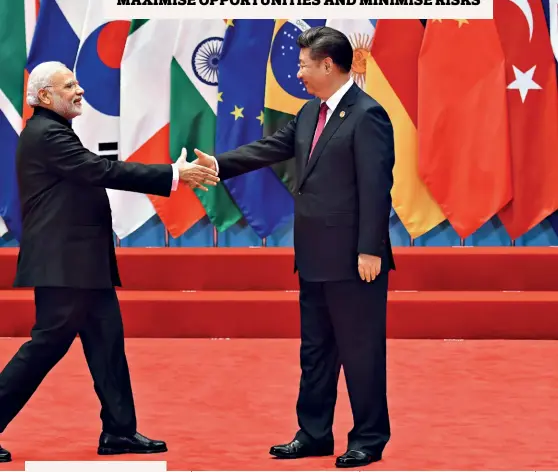  ??  ?? Modi had promised a positive shift in ties with China when he came to power in 2014. Here he is at the G20 Leaders Summit at Hangzhou in September 2016, extending a hand