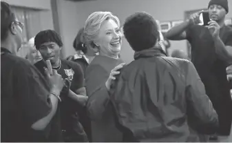  ?? JUSTIN SULLIVAN, GETTY IMAGES ?? Hillary Clinton campaignsM­onday in Cleveland.