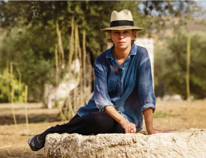  ?? ?? BELOW: Michal Rovner on her farm. LEFT: Rovner with some of the stones she uses in her work.