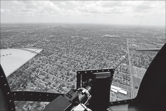  ?? [JOSHUA A. BICKEL/DISPATCH PHOTOS] ?? Those who take the 45- minute flight on the Madras Maiden will get a good view of Columbus. The plane can seat 11 passengers and three crew members during a flight.