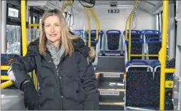  ?? JOE GIBBONS/THE TELEGRAM ?? Judy Powell, Metrobus general manager, stands in one of the three new smaller buses set to join the Metrobus fleet at the end of March.