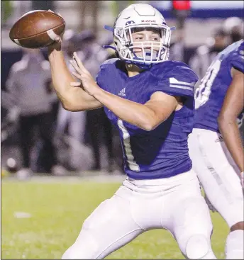  ?? (Special to NWA Democrat-Gazette/Brent Soule) ?? Rogers senior Christian Francisco drops back to pass.