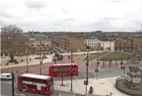  ?? — Reuters/Simon Dawson ?? CONTROVERS­Y: Buses move past Windrush Square in the Brixton district of London, Britain April 16, 2018.
