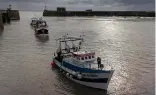  ?? ?? French trawlers arrive in the port of Granville, Normandy, after   shing.