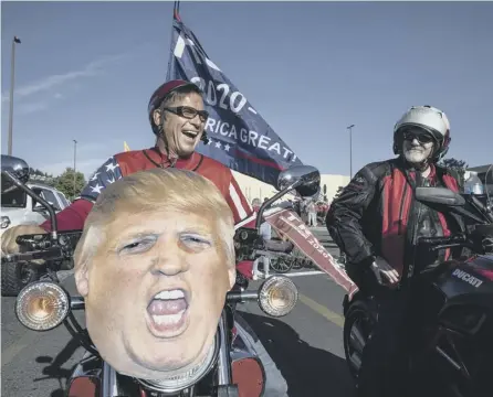  ?? PICTURE: PAULA BRONSTEIN/AP ?? Supporters of Donald Trump take part in a parade from Clackamas to Portland, Oregon