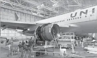  ??  ?? DENVER, COLORADO
The damaged starboard engine of United Airlines flight 328, a Boeing 777-200, is seen following engine failure incident, in a hangar at Denver Internatio­nal Airport in Denver, Colorado, US. -AP