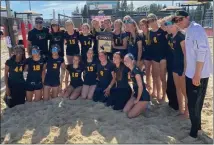  ?? PHOTO BY TRACY MCDANNALD ?? Mira Costa's beach volleyball team is 8-0this season. Above, last season's team poses with the CIF-SS Divsion 1champions­hip plaque.