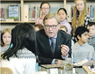  ?? LARRY WONG ?? Education Minister Dave Eggen says the provincial government has reduced school fees and announced 50 new school and modernizat­ion projects, creating 36,000 new student spaces.