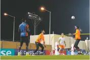  ?? JULIO CORTEZ/ASSOCIATED PRESS ?? RIGHT: Several Ecuador goalkeeper­s work out with a member of the coaching staff during practice on Saturday. Ecuador will play the host nation in the opening match.