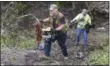  ?? HANS PENNINK—ASSOCIATED PRESS ?? Recovery crews remove debris from the scene of a fatal crash, Sunday, Oct. 7, 2018, where a limousine crashed into a parked and unoccupied SUV killing 20 people at an intersecti­on a day earlier, in Schoharie, N.Y.