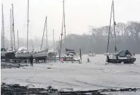  ??  ?? ● Afon Seiont overflows to the car park at Slate Quay Caernarfon. Pictures: Arwyn Roberts