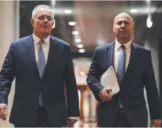  ?? ?? Prime Minister Scott Morrison and Treasurer Josh Frydenberg deliver the budget. Picture: NCA NewsWire